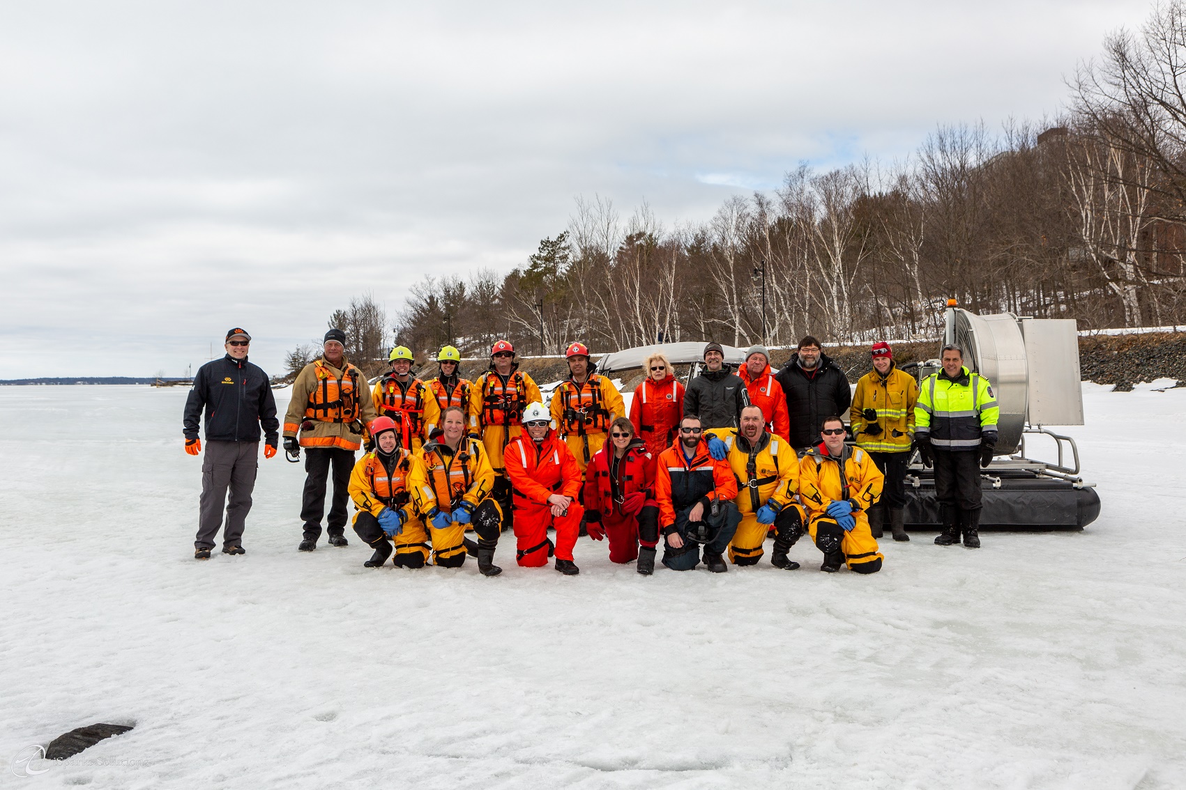 ATASD hovercraft airboat with group of Canadian Fire Rescue officers